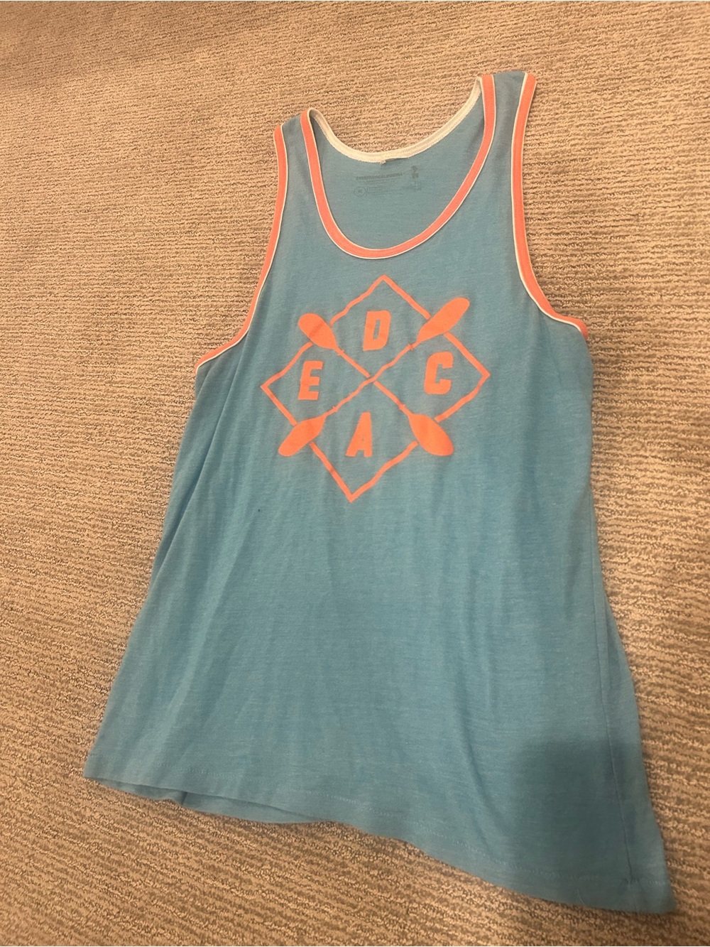Blue Tank Top with Coral Trim and Graphic Logo